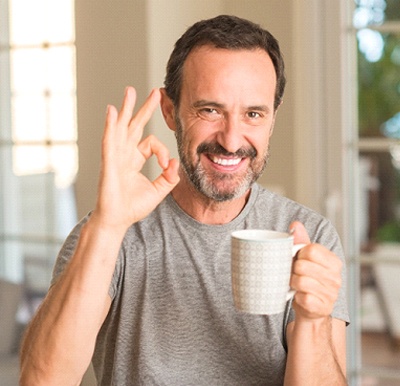 Cheerful senior man enjoying positive results from NightLase