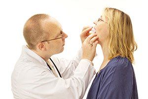 Dentist placing oral appliance