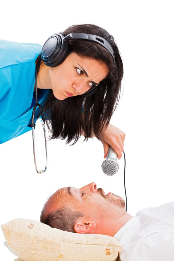 doctor listening to snoring man Weatherford Dental Sleep Medicine Blog