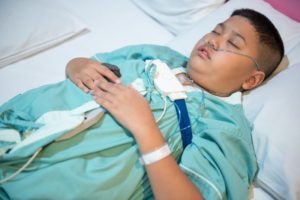 young boy participating in sleep study