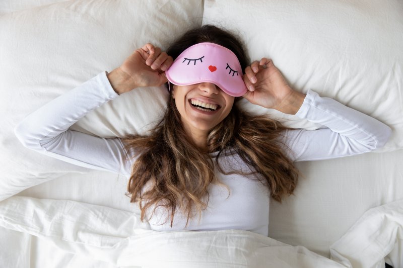 Woman smiling after receiving sleep apnea treatment in Weatherford