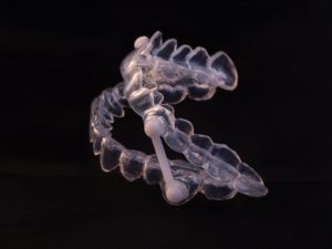 Oral appliance on black background