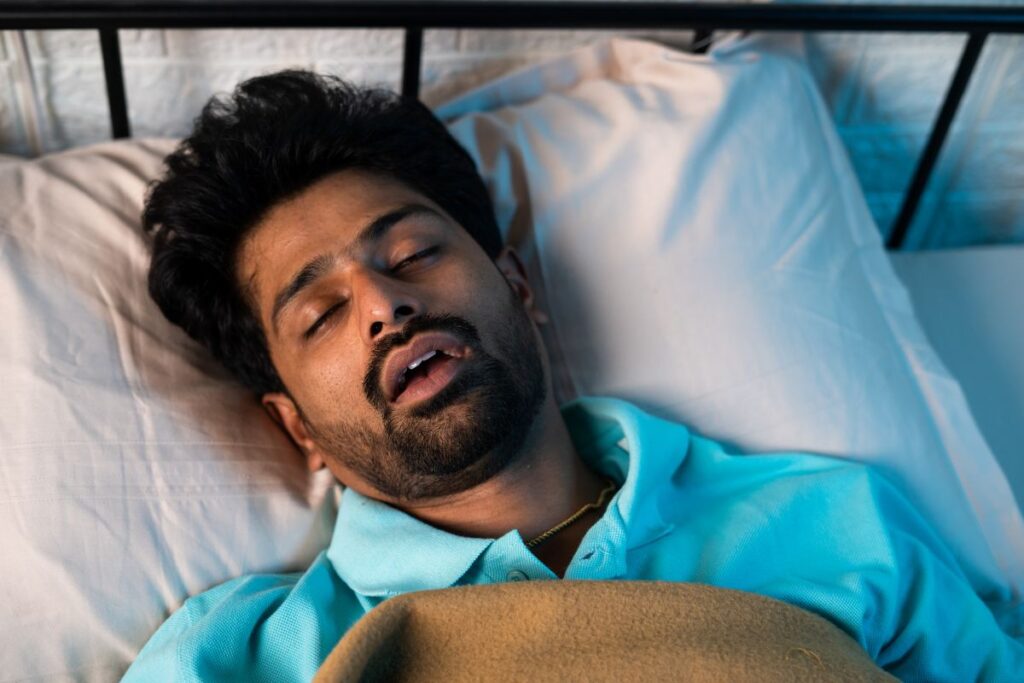 A man sleeping with his mouth open